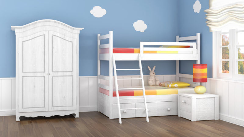 Kid's bedroom with blue walls and white clouds with white bunk bed and wardrobe