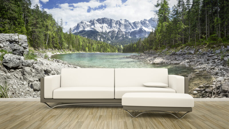 3D rendering of a sofa in front of a photo wall mural Eibsee Zugspitze
